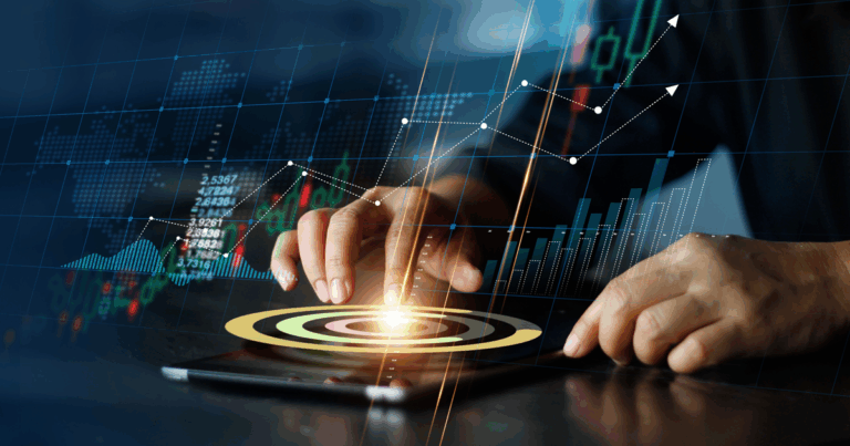 Mão interagindo com gráficos digitais em uma tela, representando o uso de tecnologia no planejamento estratégico e na análise de dados para tomada de decisões.